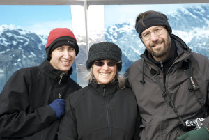 Lisa with son and husband on Alaska vacation.